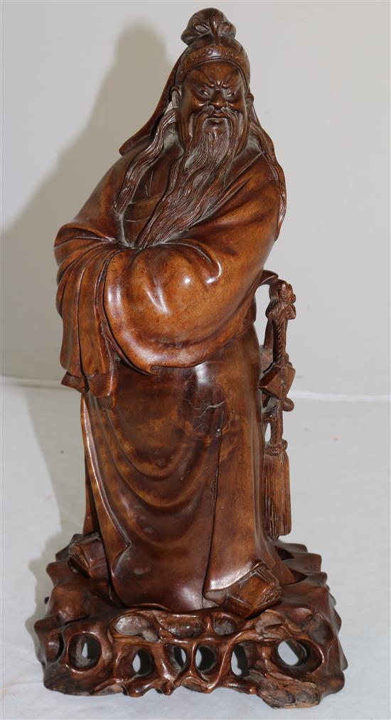 A Chinese rosewood figure of Lu Dongbin, early 20th century, total height 24cm